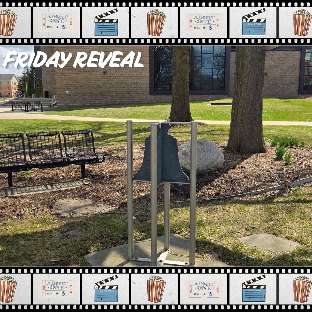 Metal bell with donor names near the pond on the Valley campus